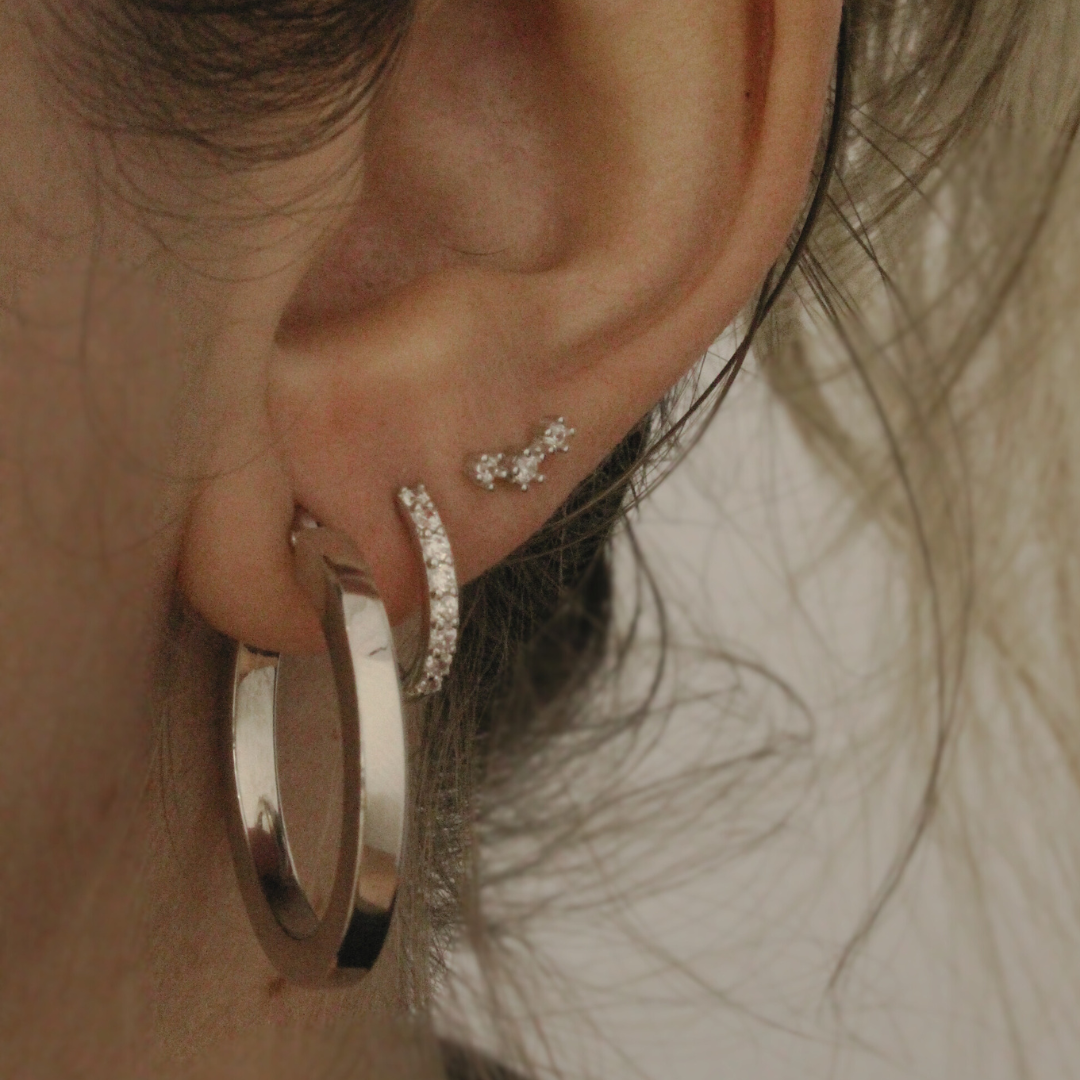 Piercing constelación