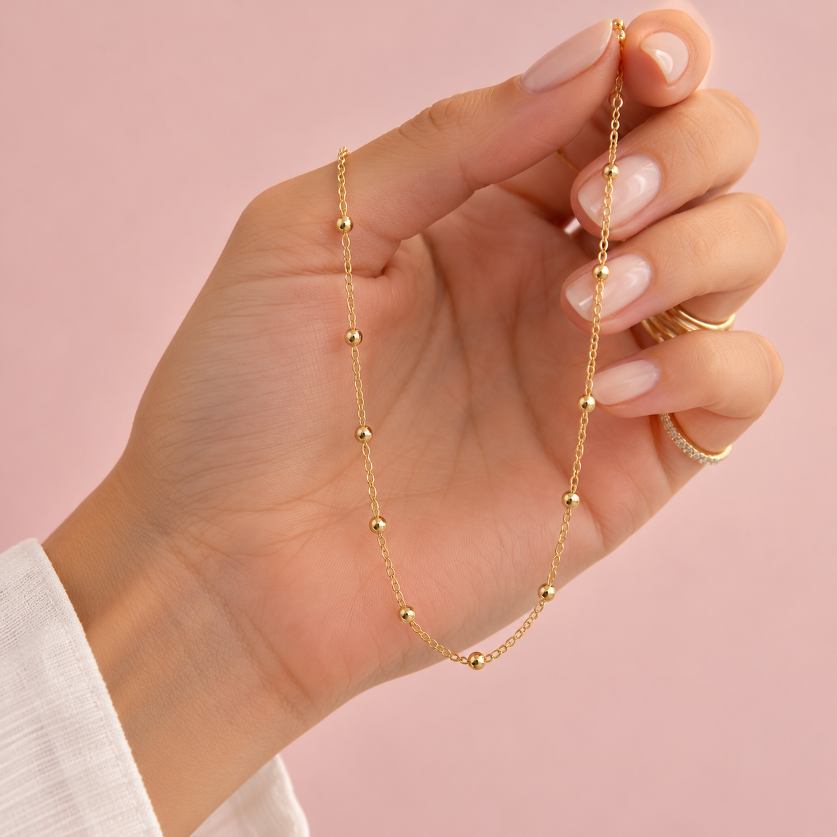 Cadena bolitas oro