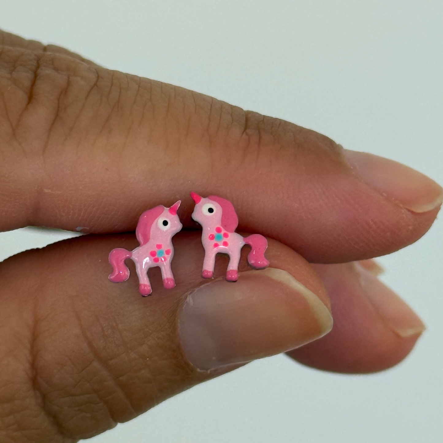 Pendientes niña